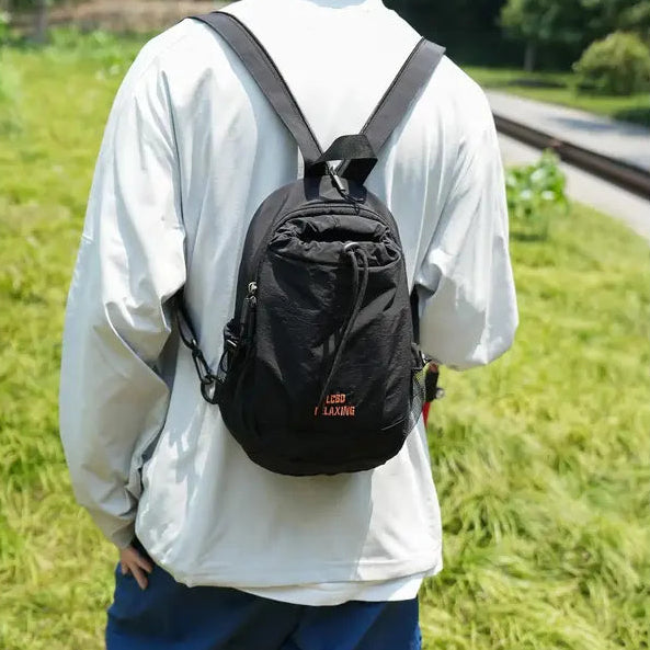 🎁Unisex Color Block Mini Backpack – Lightweight Water-Resistant Nylon Daypack